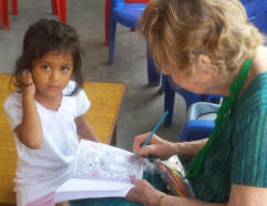 Jean enjoying local children